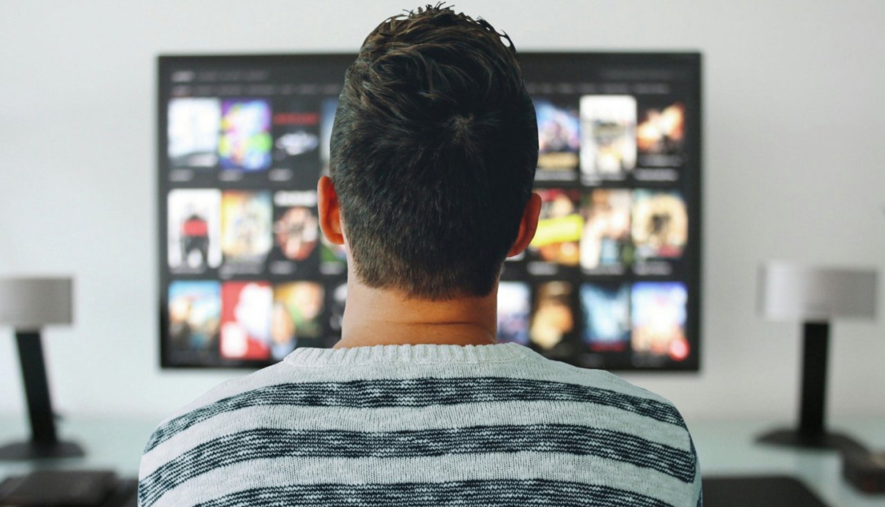 Man at the TV screen