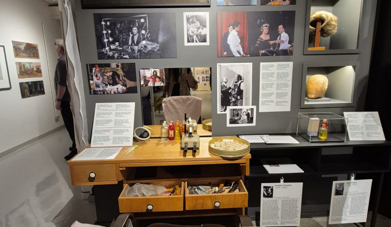 Museum space, floor and walls with exhibits, photographs of cinema artists, descriptions