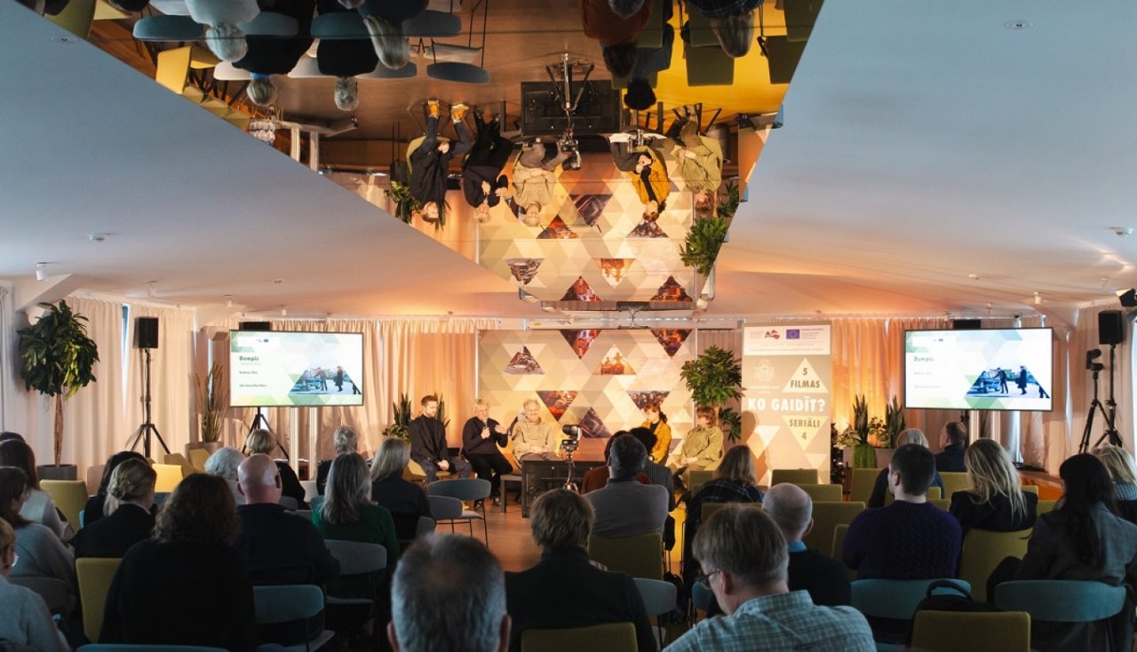 People watching a presentation in a meeting