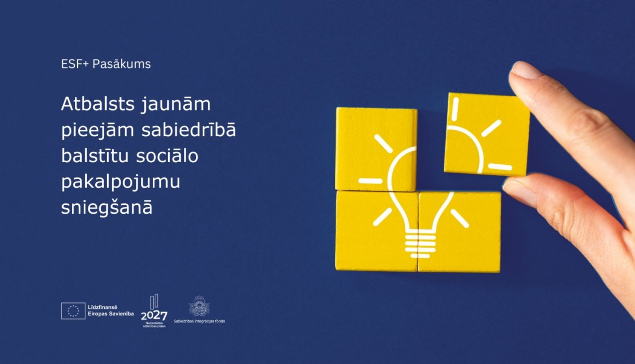 baneris: roka liek kopā četrus kubiņus ar spuldzīti, otrā pusē uzraksts 